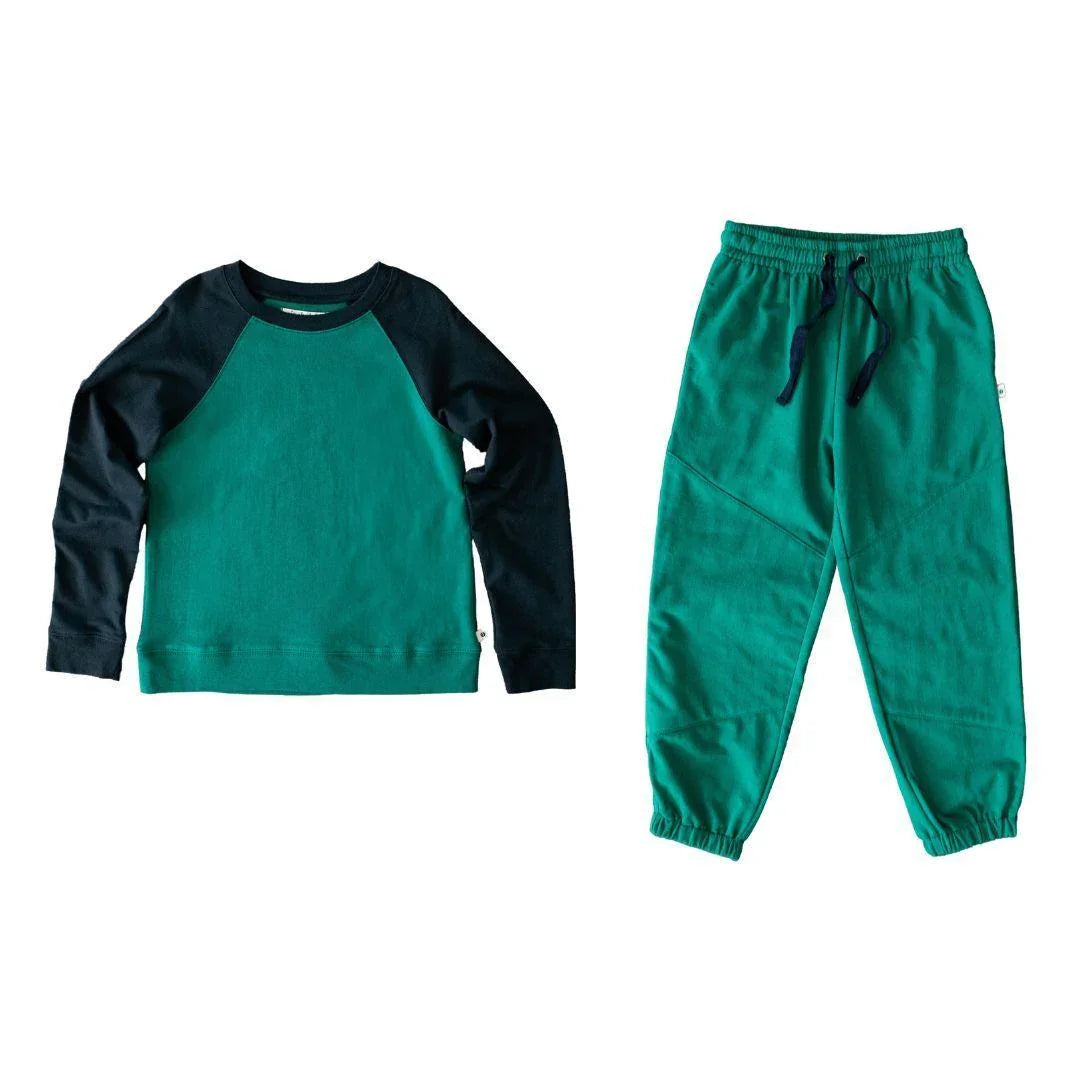 Green kids' raglan sweatshirt and sweatpants set from Jackalo, sustainable activewear.