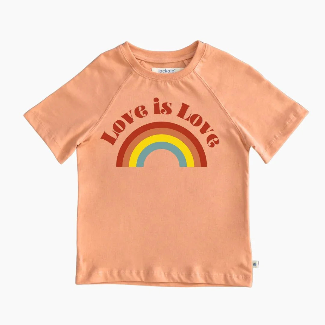 Peach kids t-shirt by Jackalo with 'Love is Love' text and rainbow graphic on front.