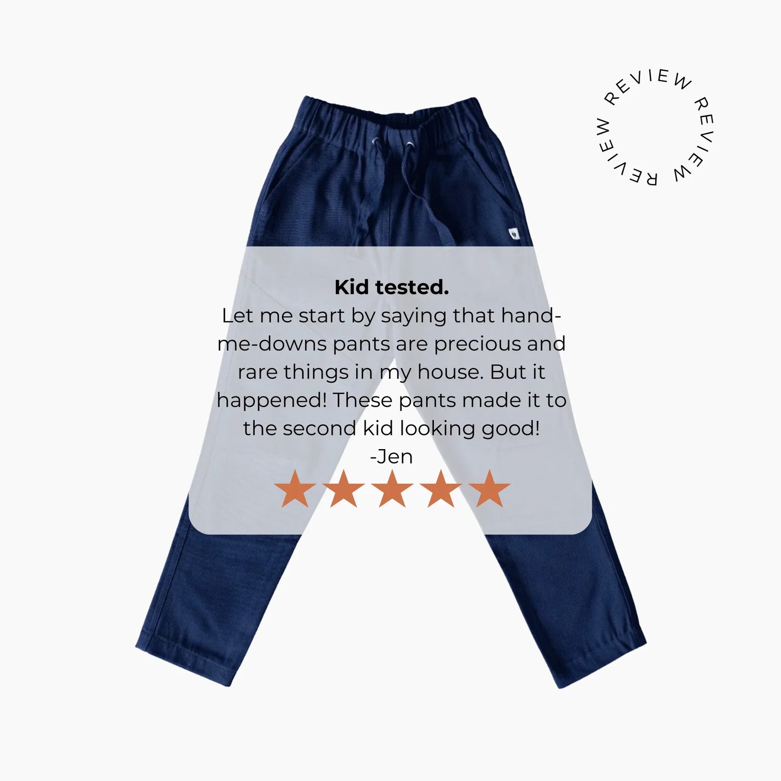 Navy blue Jackalo kids pants with five-star customer review overlay on white background.