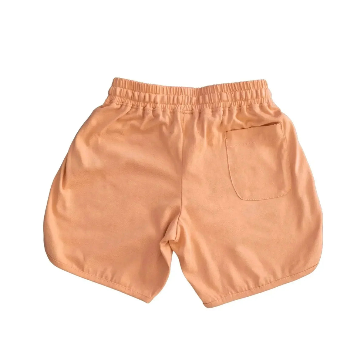 Peach kids shorts with elastic waistband and back pocket, sustainable Jackalo clothing