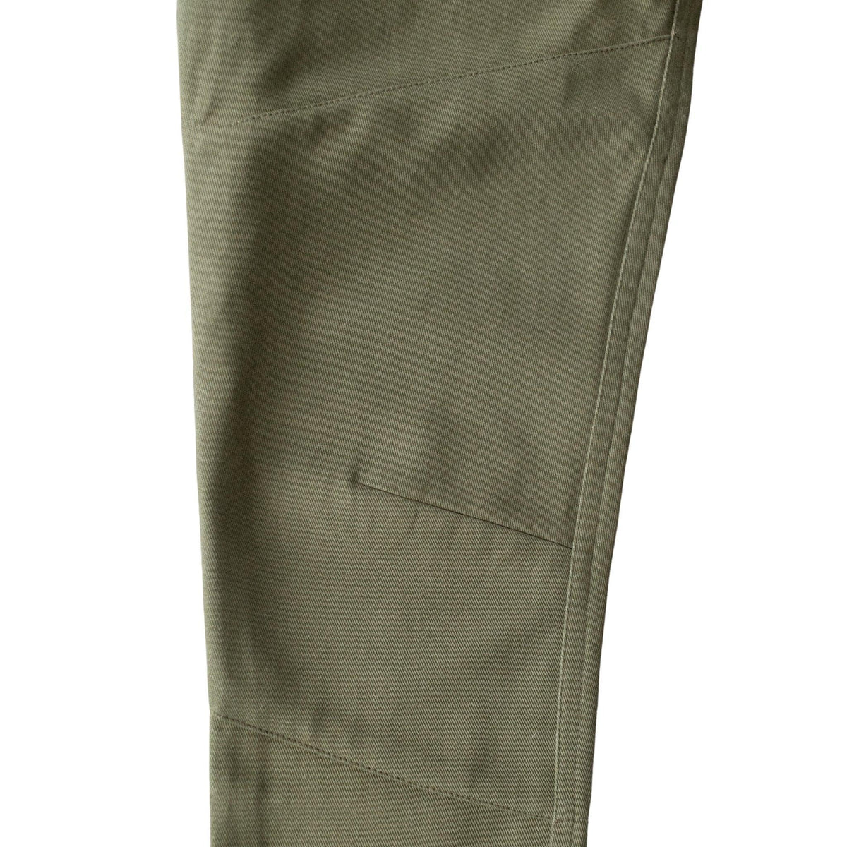Olive green kids pants detail with pocket, durable stitching, sustainable Jackalo clothing