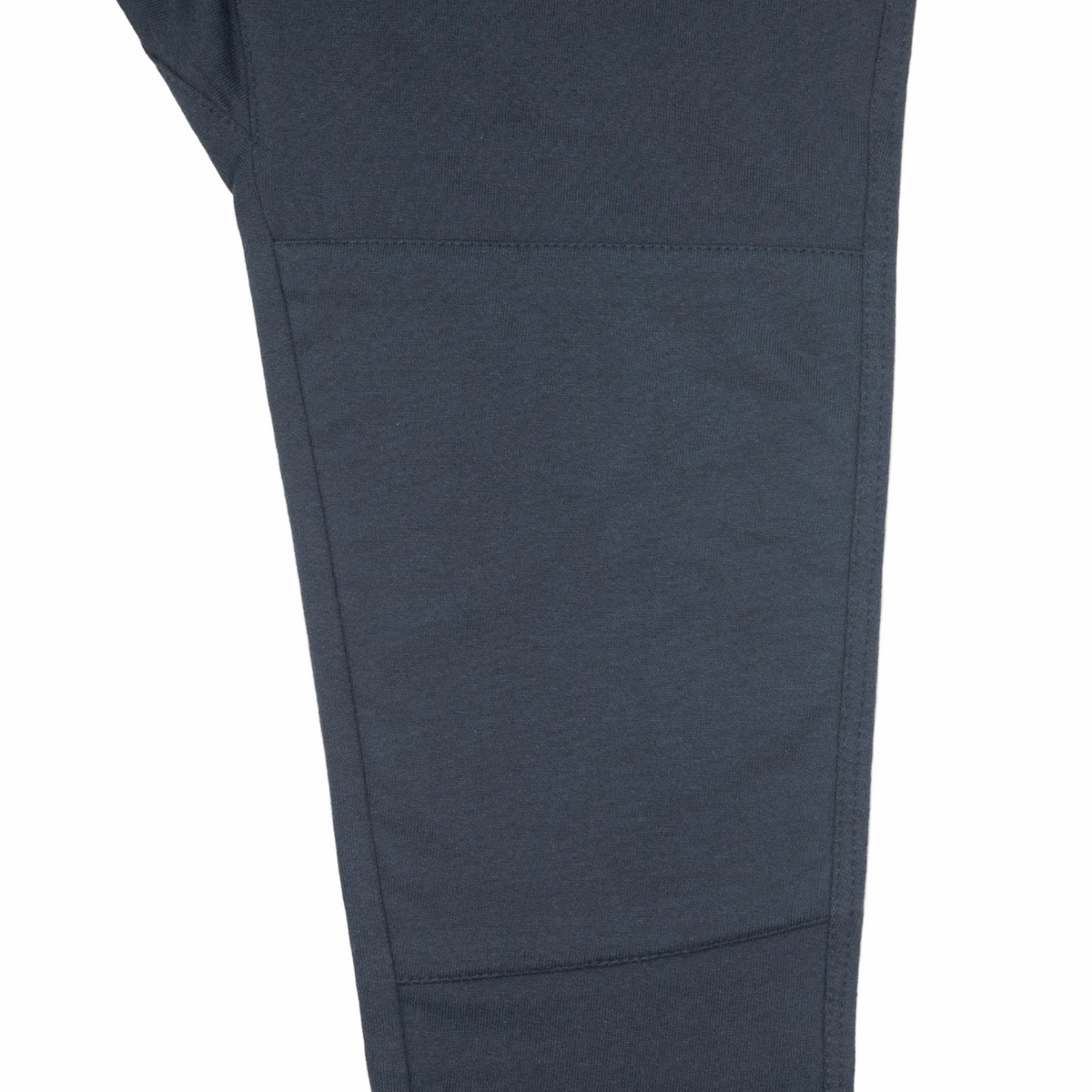 Close-up of Jackalo Kai Navy kids pants leg, sustainable activewear for children