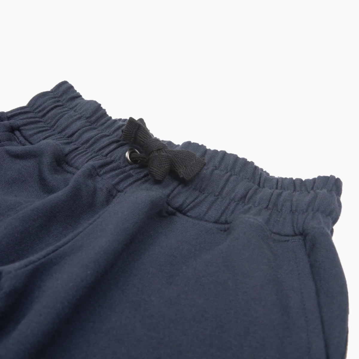 Jackalo navy kids pants with elastic waistband and black drawstring bow, sustainable clothing