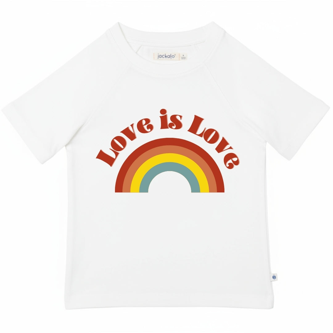 Love is love graphic with muted rainbow on a white t-shirt
