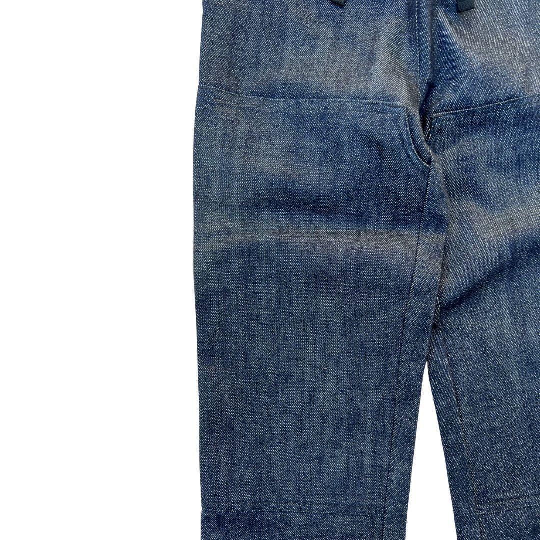 Close-up of Jackalo sustainable kids jeans in blue denim showing large front pockets