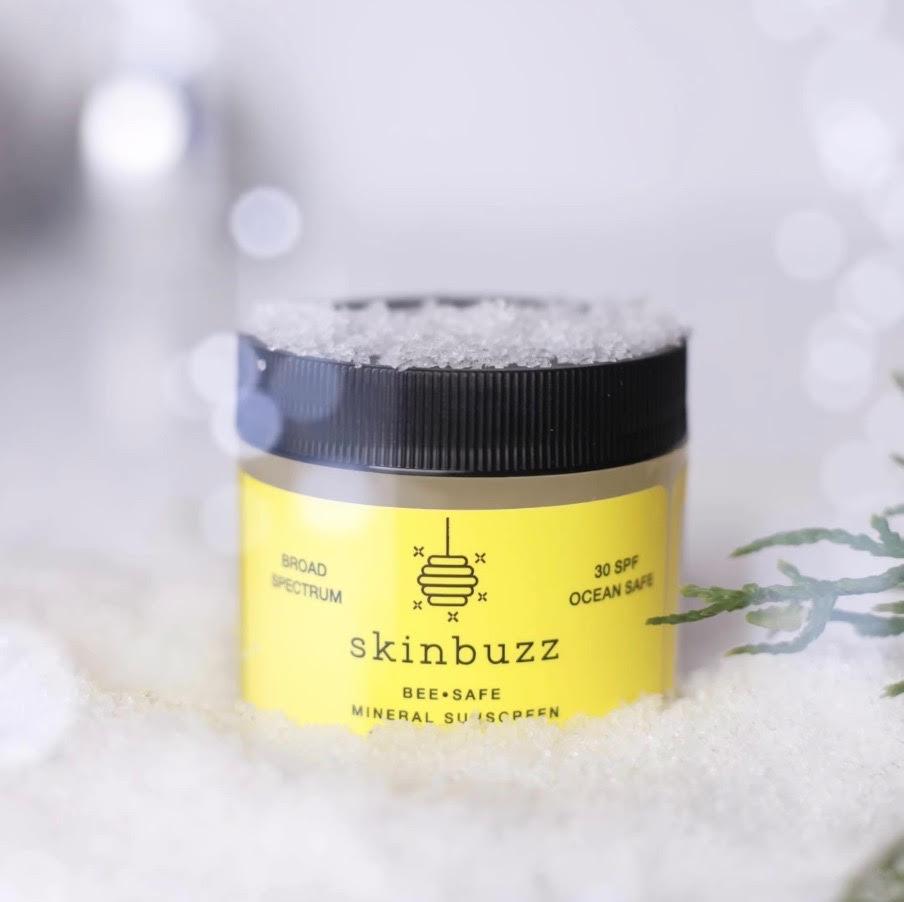 A close-up of Skinbuzz sunscreen